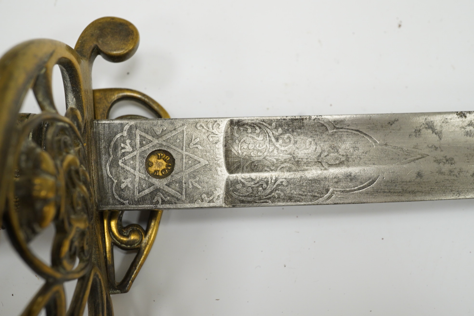 A Victorian 1845 pattern infantry officer’s sword, with regulation blade and brass hilt with folding side guard. Condition - fair, well worn over all.